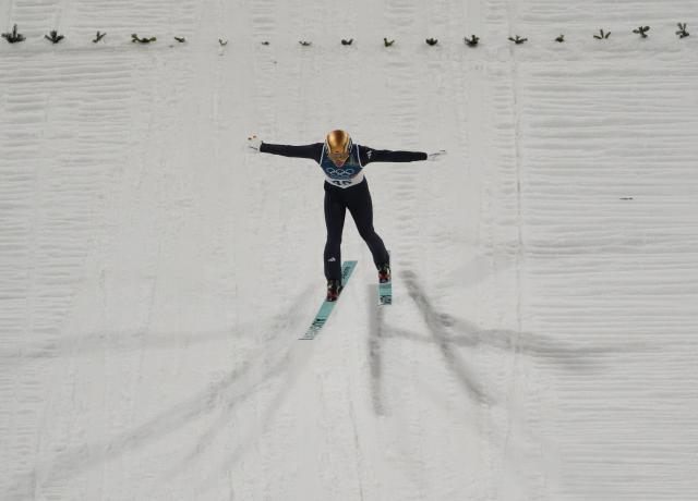 (260210) -- PREDAZZO, Feb. 10, 2026 (Xinhua) -- Philipp Raimund of Germany competes during the Ski Jumping Men's Normal Hill Individual of the 2026 Milan-Cortina Winter Olympics in Predazzo, Italy, Feb. 9, 2026. (Xinhua/Meng Yongmin)