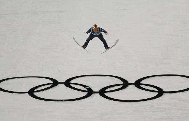 (260210) -- PREDAZZO, Feb. 10, 2026 (Xinhua) -- Philipp Raimund of Germany competes during the Ski Jumping Men's Normal Hill Individual of the 2026 Milan-Cortina Winter Olympics in Predazzo, Italy, Feb. 9, 2026. (Xinhua/Meng Yongmin)