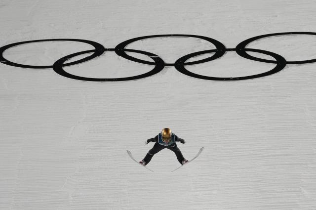 (260210) -- PREDAZZO, Feb. 10, 2026 (Xinhua) -- Valentin Foubert of France competes during the Ski Jumping Men's Normal Hill Individual of the 2026 Milan-Cortina Winter Olympics in Predazzo, Italy, Feb. 9, 2026. (Xinhua/Meng Yongmin)