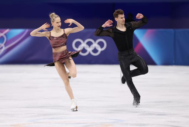 (260209) -- MILAN, Feb. 9, 2026 (Xinhua) -- Juulia Turkkila (L)/Matthias Versluis of Finland compete during the rhythm dance of figure skating ice dance competition at the Milan-Cortina 2026 Olympic Winter Games in Milan, Italy, Feb. 9, 2026. (Xinhua/Chen Yichen)