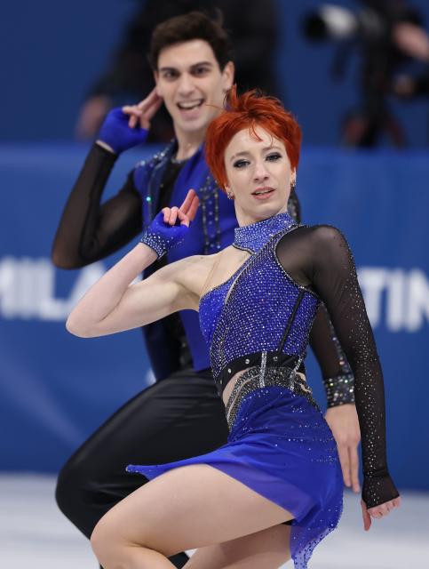 (260210) -- MILAN, Feb. 10, 2026 (Xinhua) -- Evgeniia Lopareva (front)/Geoffrey Brissaud of France perform during the rhythm dance of figure skating ice dance competition at the Milan-Cortina 2026 Olympic Winter Games in Milan, Italy, Feb. 9, 2026. (Xinhua/Chen Yichen)