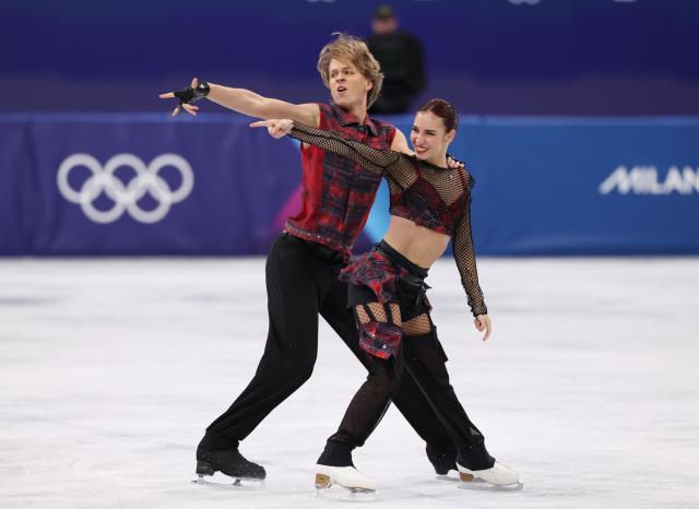 (260209) -- MILAN, Feb. 9, 2026 (Xinhua) -- Diana Davis (R)/Gleb Smolkin of Georgia compete during the rhythm dance of figure skating ice dance competition at the Milan-Cortina 2026 Olympic Winter Games in Milan, Italy, Feb. 9, 2026. (Xinhua/Chen Yichen)