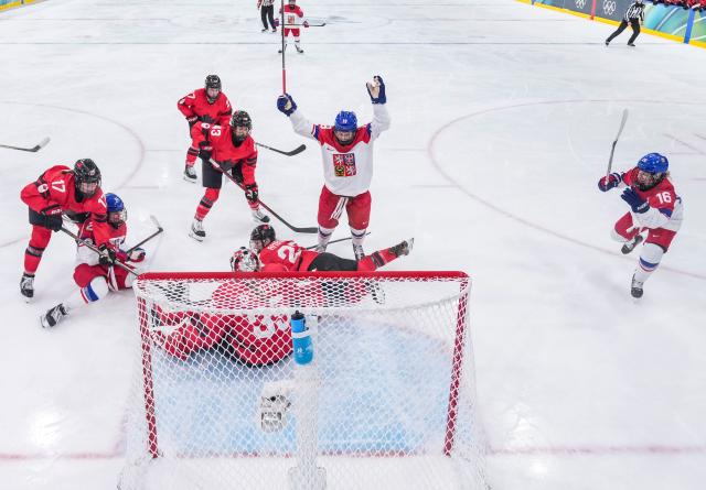 (260210) -- MILAN, Feb. 10, 2026 (Xinhua) -- Mlynkova Natalie (2nd R) of the Czech Republic celebrates a score during the ice hockey women's preliminary round group A match between Canada and the Czech Republic at the Milan-Cortina 2026 Olympic Winter Games in Milan, Italy, Feb. 9, 2026. (Xinhua/Sun Fei)