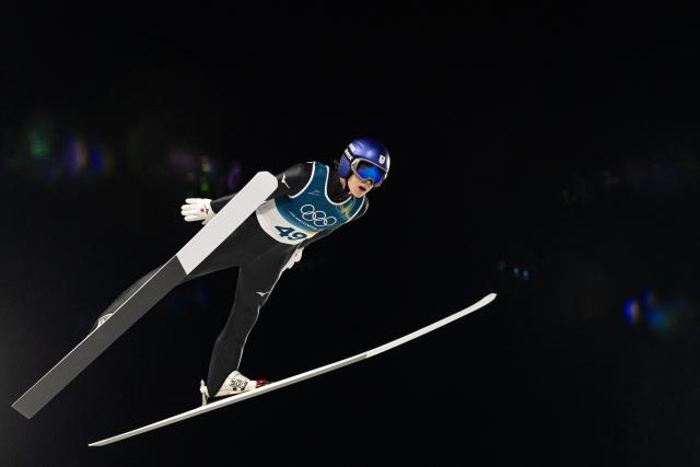 (260210) -- PREDAZZO, Feb. 10, 2026 (Xinhua) -- Kobayashi Ryoyu of Japan  competes during the Ski Jumping Men's Normal Hill Individual of the 2026 Milan-Cortina Winter Olympics in Predazzo, Italy, Feb. 9, 2026. (Xinhua/Huang Wei)