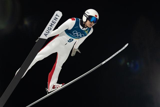 (260210) -- PREDAZZO, Feb. 10, 2026 (Xinhua) -- Song Qiwu of China competes during the Ski Jumping Men's Normal Hill Individual of the 2026 Milan-Cortina Winter Olympics in Predazzo, Italy, Feb. 9, 2026. (Xinhua/Huang Wei)
