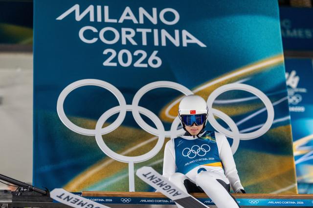 (260210) -- PREDAZZO, Feb. 10, 2026 (Xinhua) -- Song Qiwu of China reacts during the Ski Jumping Men's Normal Hill Individual of the 2026 Milan-Cortina Winter Olympics in Predazzo, Italy, Feb. 9, 2026. (Xinhua/Huang Wei)