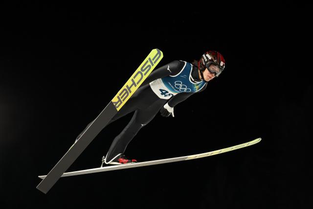 (260210) -- PREDAZZO, Feb. 10, 2026 (Xinhua) -- Nikaido Ren of Japan competes during the Ski Jumping Men's Normal Hill Individual of the 2026 Milan-Cortina Winter Olympics in Predazzo, Italy, Feb. 9, 2026. (Xinhua/Huang Wei)