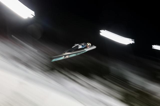 (260210) -- PREDAZZO, Feb. 10, 2026 (Xinhua) -- Giovanni Bresadola of Italy competes during the Ski Jumping Men's Normal Hill Individual of the 2026 Milan-Cortina Winter Olympics in Predazzo, Italy, Feb. 9, 2026. (Xinhua/Huang Wei)