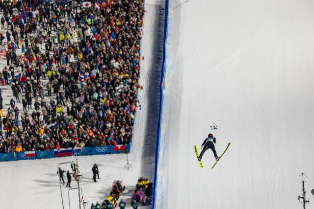 (260210) -- PREDAZZO, Feb. 10, 2026 (Xinhua) -- Nikaido Ren of Japan competes during the Ski Jumping Men's Normal Hill Individual of the 2026 Milan-Cortina Winter Olympics in Predazzo, Italy, Feb. 9, 2026. (Xinhua/Huang Wei)