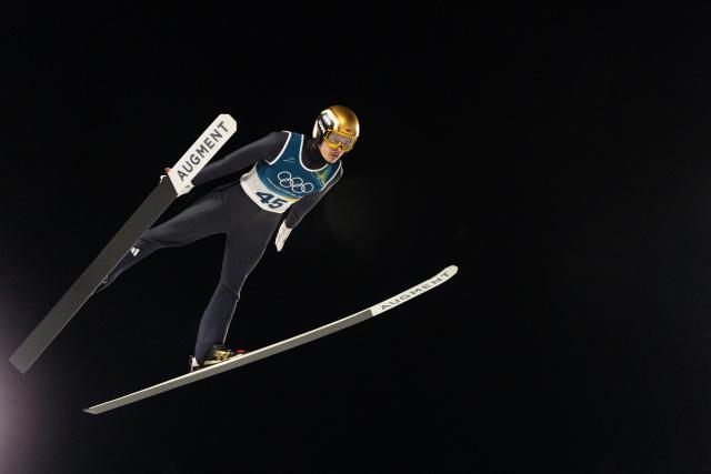 (260210) -- PREDAZZO, Feb. 10, 2026 (Xinhua) -- Philipp Raimund of Germany competes during the Ski Jumping Men's Normal Hill Individual of the 2026 Milan-Cortina Winter Olympics in Predazzo, Italy, Feb. 9, 2026. (Xinhua/Huang Wei)