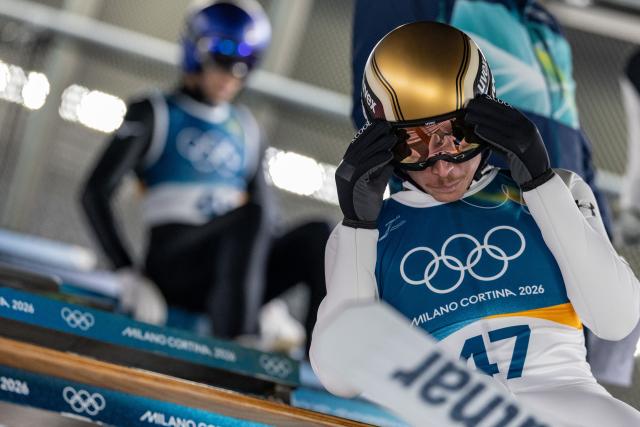 (260210) -- PREDAZZO, Feb. 10, 2026 (Xinhua) -- Anze Lanisek of Slovenia reacts during the Ski Jumping Men's Normal Hill Individual of the 2026 Milan-Cortina Winter Olympics in Predazzo, Italy, Feb. 9, 2026. (Xinhua/Huang Wei)