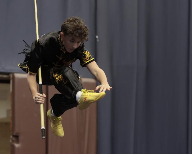 (260210) -- BUDAPEST, Feb. 10, 2026 (Xinhua) -- Konrad Vereb, a member of the Hungarian Wushu Team,  showcases his training result during a Wushu training camp in Budapest, Hungary, on Feb. 8, 2026. TO GO WITH 'Feature: Europe's young Wushu athletes sharpen skills as Youth Olympic debut nears' (Photo by Laszlo Balogh/Xinhua)