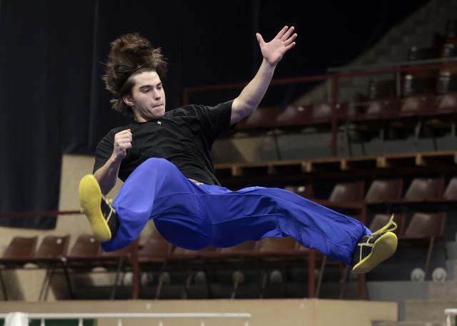 (260210) -- BUDAPEST, Feb. 10, 2026 (Xinhua) -- Jorg Daniel Aebischer, a member of the Swiss Wushu Team, showcases his training result during a Wushu training camp in Budapest, Hungary, on Feb. 8, 2026. TO GO WITH 'Feature: Europe's young Wushu athletes sharpen skills as Youth Olympic debut nears' (Photo by Laszlo Balogh/Xinhua)