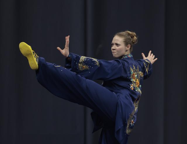 (260210) -- BUDAPEST, Feb. 10, 2026 (Xinhua) -- An athlete showcases her training result during a Wushu training camp in Budapest, Hungary, on Feb. 8, 2026. TO GO WITH 'Feature: Europe's young Wushu athletes sharpen skills as Youth Olympic debut nears' (Photo by Laszlo Balogh/Xinhua)