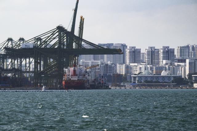 (260210) -- SINGAPORE, Feb. 10, 2026 (Xinhua) -- This photo taken on Feb. 9, 2026 shows the Tanjong Pagar container terminal of Singapore. Singapore's economy grew by 5 percent in 2025, easing from 5.3 percent in 2024, the Ministry of Trade and Industry said on Tuesday, while raising its growth forecast for 2026 to a range of 2 to 4 percent. (Photo by Then Chih Wey/Xinhua)
