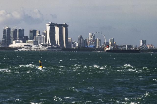 (260210) -- SINGAPORE, Feb. 10, 2026 (Xinhua) -- This photo taken on Feb. 9, 2026 shows the city skyline of Singapore. Singapore's economy grew by 5 percent in 2025, easing from 5.3 percent in 2024, the Ministry of Trade and Industry said on Tuesday, while raising its growth forecast for 2026 to a range of 2 to 4 percent. (Photo by Then Chih Wey/Xinhua)