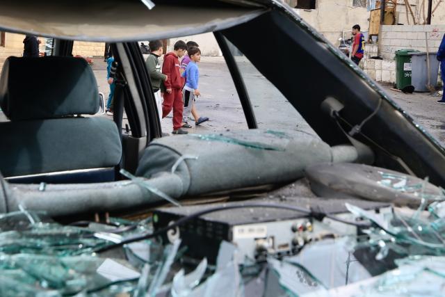 (260210) -- BEIJING, Feb. 10, 2026 (Xinhua) -- This photo taken on Feb. 9, 2026 shows the wreckage of a car that was bombed by an Israeli drone strike in Yanouh, southern Lebanon. Israeli troops carried out operations in Gaza and Lebanon on Monday, killing at least 8 people.
   In southern Lebanon, three people, including a child, were killed in an Israeli drone strike on a vehicle, according to the Emergency Operations Center of the Lebanese Ministry of Public Health. (Photo by Ali Hashisho/Xinhua)