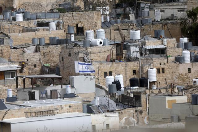 (260210) -- HEBRON, Feb. 10, 2026 (Xinhua) -- This photo taken on Feb. 9, 2026 shows the Israeli settlement in the West Bank city of Hebron. Israel's recent decisions to deepen control over the West Bank and expand Jewish settlements there have raised broad Palestinian concerns over potential land confiscation and threats to regional stability. (Photo by Mamoun Wazwaz/Xinhua)