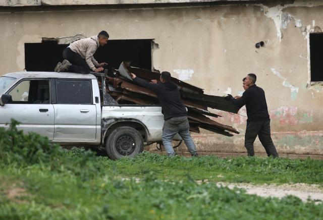 (260210) -- JENIN, Feb. 10, 2026 (Xinhua) -- Palestinians collect belongings to leave after Israeli forces forced them to evacuate their homes in the town of Arraba, south of Jenin city in the West Bank, on Feb. 9, 2026. Israel's recent decisions to deepen control over the West Bank and expand Jewish settlements there have raised broad Palestinian concerns over potential land confiscation and threats to regional stability. (Photo by Nidal Eshtayeh/Xinhua)