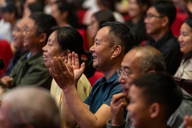 (260210) -- NAIROBI, Feb. 10, 2026 (Xinhua) -- People watch a performance at the Kenya National Theatre in Nairobi, Kenya, on Feb. 9, 2026. A vibrant cultural show featuring Chinese martial arts, acrobatics and dance was staged here on Monday during the Gansu (China) Happy Chinese New Year Gala: Africa Tour. (Xinhua/Xie Jianfei)