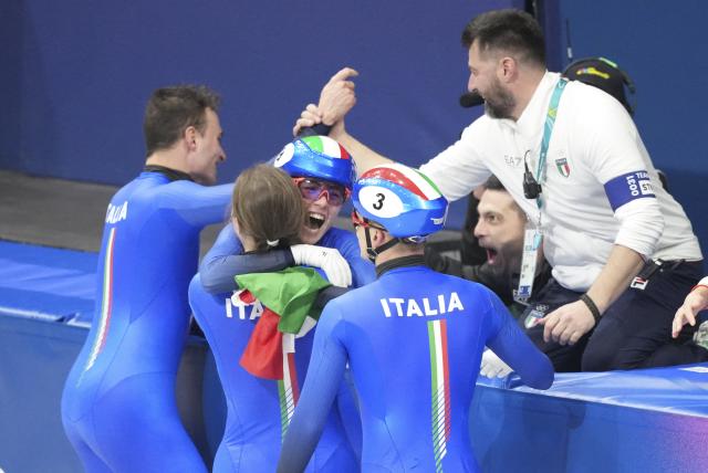 (260210) -- MILAN, Feb. 10, 2026 (Xinhua) -- Members of team Italy celebrate after the short track speed skating mixed team relay final A at the Milan-Cortina 2026 Olympic Winter Games in Milan, Italy, Feb. 10, 2026. (Xinhua/Xue Yuge)