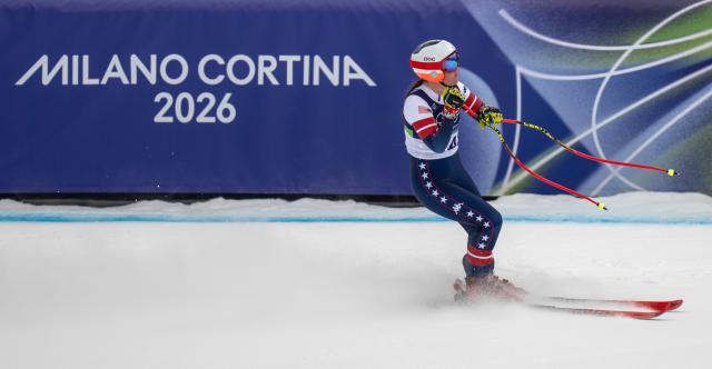 (260210) -- CORTINA D'AMPEZZO, Feb. 10, 2026 (Xinhua) -- Breezy Johnson of the United States competes during the downhill race of the alpine skiing women's team combined at the Milan-Cortina 2026 Olympic Winter Games in Cortina, Italy, Feb. 10, 2026. (Xinhua/Fei Maohua)