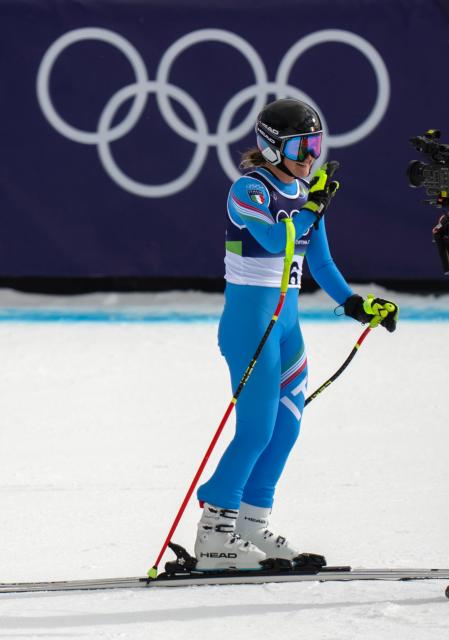 (260210) -- CORTINA D'AMPEZZO, Feb. 10, 2026 (Xinhua) -- Laura Pirovano of Italy reacts after the downhill race of the alpine skiing women's team combined at the Milan-Cortina 2026 Olympic Winter Games in Cortina, Italy, Feb. 10, 2026. (Xinhua/Fei Maohua)