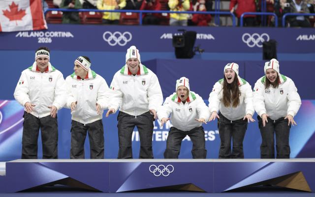 (260210) -- MILAN, Feb. 10, 2026 (Xinhua) -- Gold medalists team Italy celebrate during the awarding ceremony for the short track speed skating mixed team relay at the Milan-Cortina 2026 Olympic Winter Games in Milan, Italy, Feb. 10, 2026. (Xinhua/Li Ming)