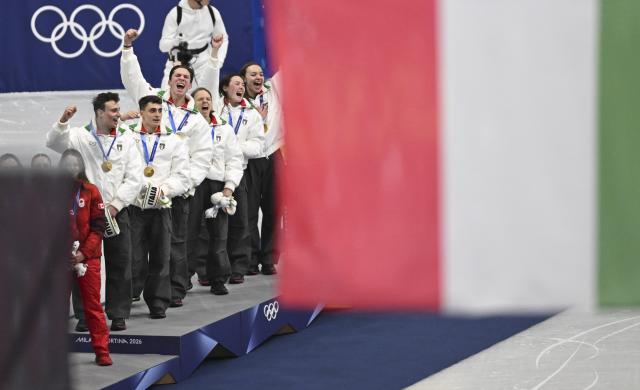 (260210) -- MILAN, Feb. 10, 2026 (Xinhua) -- Gold medalists team Italy celebrate during the awarding ceremony for the short track speed skating mixed team relay at the Milan-Cortina 2026 Olympic Winter Games in Milan, Italy, Feb. 10, 2026. (Xinhua/Cheng Min)