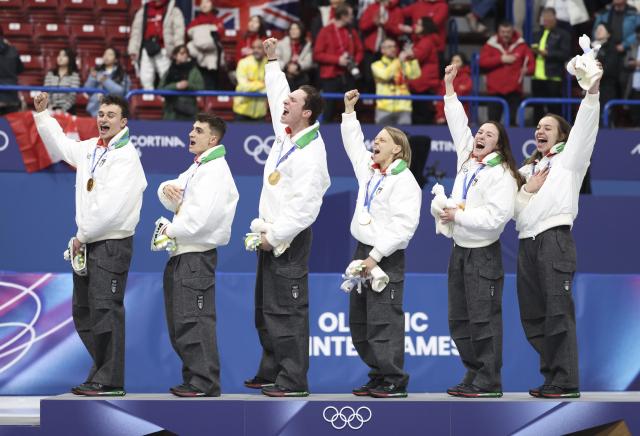 (260210) -- MILAN, Feb. 10, 2026 (Xinhua) -- Gold medalists team Italy celebrate during the awarding ceremony for the short track speed skating mixed team relay at the Milan-Cortina 2026 Olympic Winter Games in Milan, Italy, Feb. 10, 2026. (Xinhua/Li Ming)