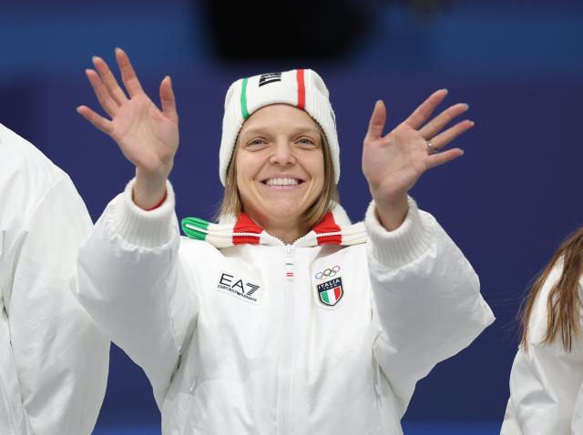 (260210) -- MILAN, Feb. 10, 2026 (Xinhua) -- Arianna Fontana of Italy reacts during the awarding ceremony for the short track speed skating mixed team relay at the Milan-Cortina 2026 Olympic Winter Games in Milan, Italy, Feb. 10, 2026. (Xinhua/Li Ming)