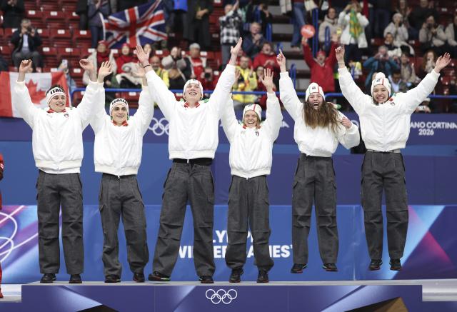 (260210) -- MILAN, Feb. 10, 2026 (Xinhua) -- Gold medalists team Italy celebrate during the awarding ceremony for the short track speed skating mixed team relay at the Milan-Cortina 2026 Olympic Winter Games in Milan, Italy, Feb. 10, 2026. (Xinhua/Li Ming)