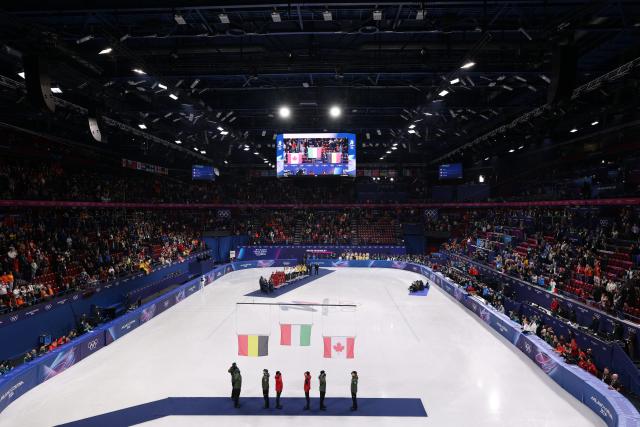 (260210) -- MILAN, Feb. 10, 2026 (Xinhua) -- This photo taken on Feb. 10, 2026 shows the awarding ceremony for the short track speed skating mixed team relay at the Milan-Cortina 2026 Olympic Winter Games in Milan, Italy. (Xinhua/Chen Yichen)