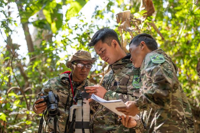 (260210) -- YINGJIANG, Feb. 10, 2026 (Xinhua) -- Members of the "Hornbill Patrol Team" record the status of hornbills in Shiti Village, Yingjiang County, southwest China's Yunnan Province, Feb. 6, 2026. In Yunnan Tongbiguan provincial nature reserve, hornbills, a species under first-class state protection in China, are in a critical period of breeding preparation. Members of the "Hornbill Patrol Team" conduct regular patrols to ensure their safety during the breeding season.
   The "Hornbill Patrol Team" is composed of local villagers and forest rangers. Since its establishment in 2021, the team has grown to 26 members. Apart from patrolling, many of them also work as bird-watching guides or are involved in the ecological industry, achieving a positive interaction between ecological conservation and community development. (Xinhua/Gao Yongwei)