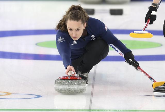 (260210) -- CORTINA D'AMPEZZO, Feb. 10, 2026 (Xinhua) -- Jennifer Dodds of Britain competes during the curling mixed doubles bronze medal match between Britain and Italy at the Milan-Cortina 2026 Olympic Winter Games in Cortina, Italy, Feb. 10, 2026. (Xinhua/Ding Xu)