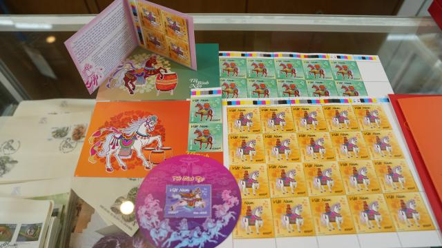 (260210) -- HANOI, Feb. 10, 2026 (Xinhua) -- Horse-themed stamp collections are pictured in Hanoi, Vietnam, Feb. 4, 2026 TO GO WITH "Feature: Horse imagery fills Vietnamese festive spaces as Lunar New Year approaches" (Xinhua/Liu Ying)