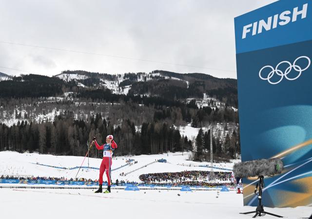 (260210) -- TESERO, Feb. 10, 2026 (Xinhua) -- Johannes Hoesflot Klaebo of Norway reacts after the cross-country skiing men's sprint classic final at the Milan-Cortina 2026 Olympic Winter Games in Tesero, Italy, Feb. 10, 2026. (Xinhua/He Canling)