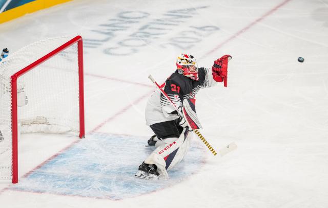 (260210) -- MILAN, Feb. 10, 2026 (Xinhua) -- Kawaguchi Riko of Japan saves a goal during the ice hockey women's preliminary round group B match between Sweden and Japan at the Milan-Cortina 2026 Olympic Winter Games in Milan, Italy, Feb. 10, 2026. (Xinhua/Sun Fei)
