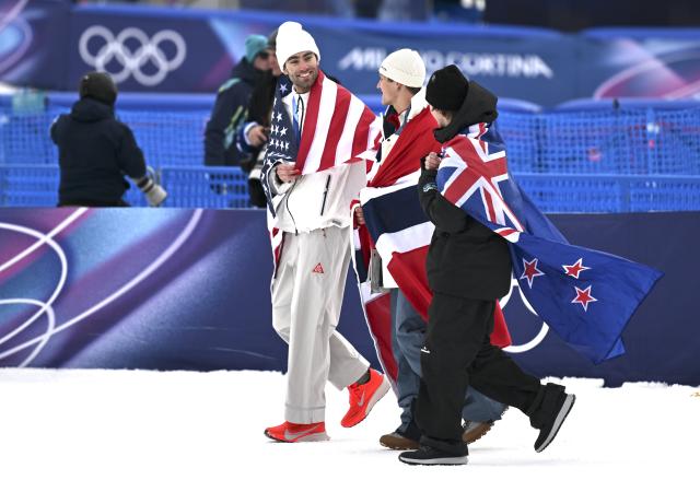 (260210) -- LIVIGNO, Feb. 10, 2026 (Xinhua) -- Gold medalist Birk Ruud (C) of Norway, silver medalist Alex Hall (L) of the United States and bronze medalist Luca Harrington of New Zealand pose during the awarding ceremony for the freestyle skiing men's freeski slopestyle at the Milan-Cortina 2026 Olympic Winter Games in Livigno, Italy, Feb. 10, 2026. (Xinhua/Xia Yifang)