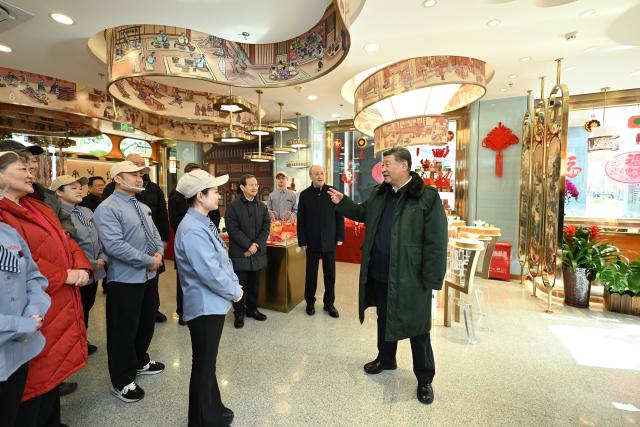 (260210) -- BEIJING, Feb. 10, 2026 (Xinhua) -- Chinese President Xi Jinping, also general secretary of the Communist Party of China Central Committee and chairman of the Central Military Commission, visits a store of the traditional bakery brand Daoxiangcun at the Longfusi commercial area in Dongcheng District of Beijing, capital of China, Feb. 10, 2026. Xi visited primary-level officials and residents in Beijing during a two-day inspection tour from Monday to Tuesday. (Xinhua/Xie Huanchi)
