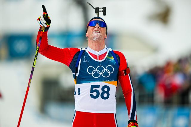 (260210) -- ANTERSELVA, Feb. 10, 2026 (Xinhua) -- Johan-Olav Botn of Norway celebrates after the biathlon men's 20km individual at the Milan-Cortina 2026 Olympic Winter Games in Anterselva, Italy, Feb. 10, 2026. (Xinhua/Jiang Han)