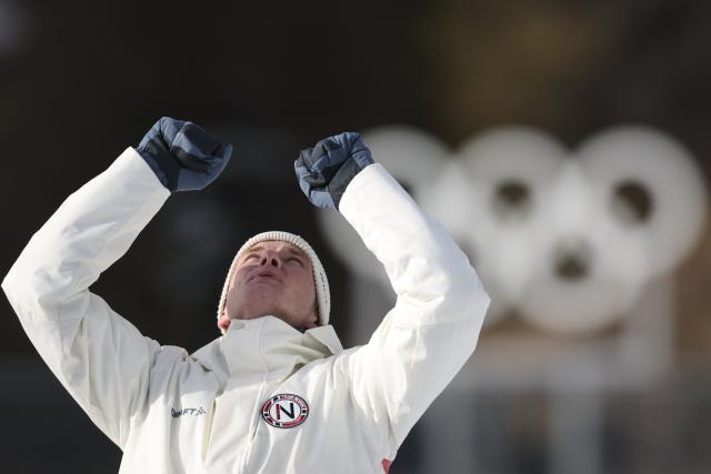 (260210) -- ANTERSELVA, Feb. 10, 2026 (Xinhua) -- Gold medalist Johan-Olav Botn of Norway celebrates during the awarding ceremony of the biathlon men's 20km individual at the Milan-Cortina 2026 Olympic Winter Games in Anterselva, Italy, Feb. 10, 2026. (Xinhua/Zhang Tao)