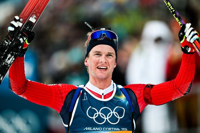 (260210) -- ANTERSELVA, Feb. 10, 2026 (Xinhua) -- Johan-Olav Botn of Norway celebrates after the biathlon men's 20km individual at the Milan-Cortina 2026 Olympic Winter Games in Anterselva, Italy, Feb. 10, 2026. (Xinhua/Jiang Han)