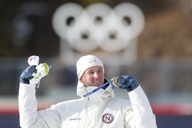 (260210) -- ANTERSELVA, Feb. 10, 2026 (Xinhua) -- Gold medalist Johan-Olav Botn of Norway celebrates during the awarding ceremony of the biathlon men's 20km individual at the Milan-Cortina 2026 Olympic Winter Games in Anterselva, Italy, Feb. 10, 2026. (Xinhua/Zhang Tao)
