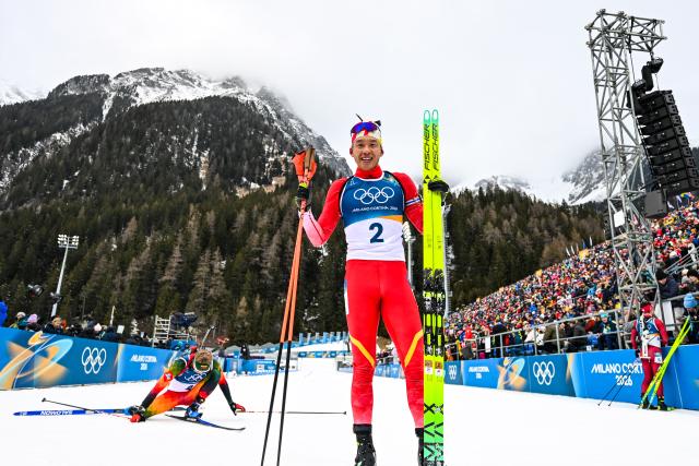 (260210) -- ANTERSELVA, Feb. 10, 2026 (Xinhua) -- Yan Xingyuan of China celebrates after the biathlon men's 20km individual at the Milan-Cortina 2026 Olympic Winter Games in Anterselva, Italy, Feb. 10, 2026. (Xinhua/Jiang Han)