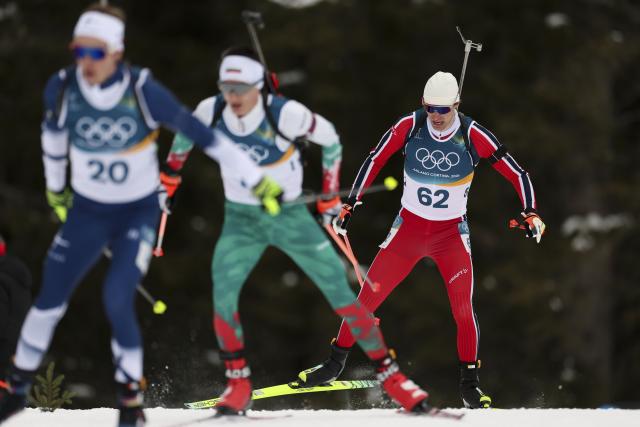 (260210) -- ANTERSELVA, Feb. 10, 2026 (Xinhua) -- Sturla Holm Laegreid (R) of Norway competes during the biathlon men's 20km individual at the Milan-Cortina 2026 Olympic Winter Games in Anterselva, Italy, Feb. 10, 2026. (Xinhua/Zhang Tao)