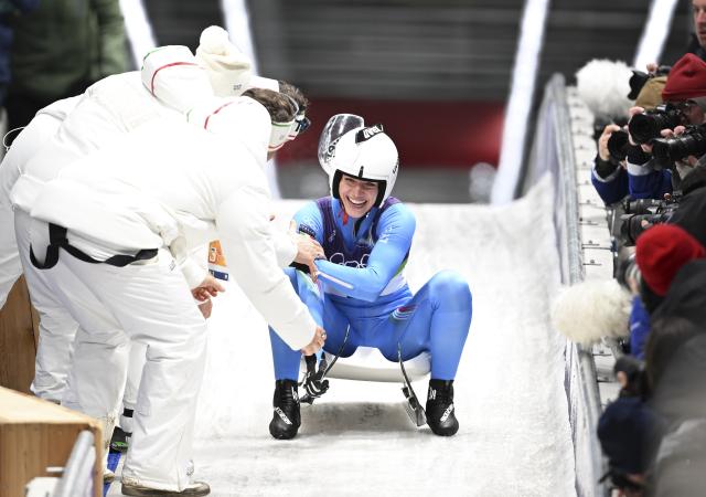 (260210) -- CORTINA D'AMPEZZO, Feb. 10, 2026 (Xinhua) -- Verena Hofera of Italy celebrates during the luge women's singles run 4 at the Milan-Cortina 2026 Olympic Winter Games in Cortina, Italy, Feb. 10, 2026. (Xinhua/Lian Yi)