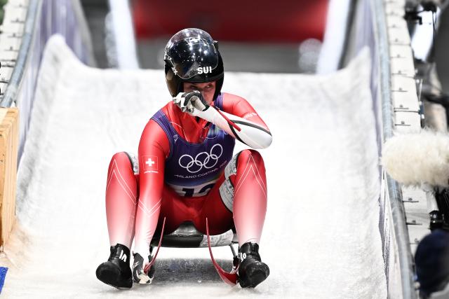 (260210) -- CORTINA D'AMPEZZO, Feb. 10, 2026 (Xinhua) -- Natalie Maag of Switzerland reacts after the luge women's singles run 3 at the Milan-Cortina 2026 Olympic Winter Games in Cortina, Italy, Feb. 10, 2026. (Xinhua/Lian Yi)