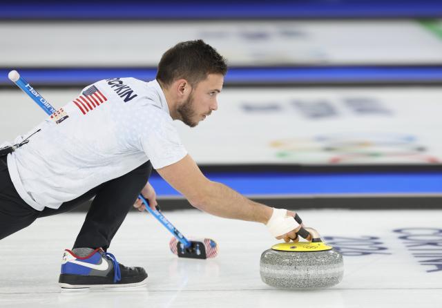 (260210) -- CORTINA D'AMPEZZO, Feb. 10, 2026 (Xinhua) -- Korey Dropkin of the United States competes during the curling mixed doubles gold medal match between Sweden and the United States at the Milan-Cortina 2026 Olympic Winter Games in Cortina, Italy, Feb. 10, 2026. (Xinhua/Ding Xu)