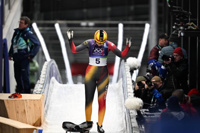 (260210) -- CORTINA D'AMPEZZO, Feb. 10, 2026 (Xinhua) -- Merle Malou Fraebel of Germany reacts after the luge women's singles run 3 at the Milan-Cortina 2026 Olympic Winter Games in Cortina, Italy, Feb. 10, 2026. (Xinhua/Lian Yi)